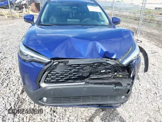 2024 Toyota Corolla Cross XLE with VIN 7MUDAABG8RV106100, listed as a IAAI auction lot 42220089 with 8,181 mi miles and . Bid and sale history available at DreamBid. Image 6.