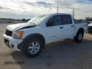 2011 Nissan Titan Pro-4X with VIN 1N6BA0EC4BN318053, listed as a Copart auction lot 61825245 with 153,557 mi miles and Salvage title. Bid and sale history available at DreamBid. Image 1.