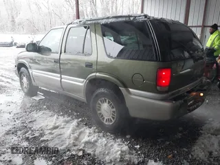 2001 GMC Jimmy SLE with VIN 1GKDT13W212171101, listed as a IAAI auction lot 41546523 with 229,471 mi miles. Bid and sale history available at carsss.com. Image 3.