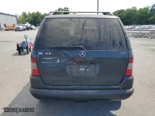 1999 Mercedes-Benz M-Class with VIN 4JGAB72E7XA107952, listed as a Copart auction lot 58559244 with 175,236 mi miles and Non Repairable. Bid and sale history available at carsss.com. Image 6.