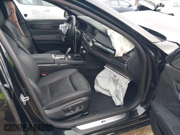 2015 BMW 7 Series 740i с VIN WBAYA6C54FGK16411, выставлен на аукционе IAAI как лот 42332689 с пробегом 59 153 миль миль и . История ставок и продаж доступна на DreamBid. Изображение 5.
