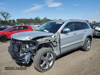 2012 Jeep Grand Cherokee Limited z VIN 1C4RJFBTXCC249830, wystawiony jako Copart lot #55751015 z przebiegiem 135 601 mil mil oraz Szkoda całkowita • Salvage title. Historia ofert i sprzedaży dostępna na DreamBid. Obrazek 1.