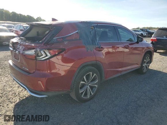 2021 Lexus RX with VIN JTJHZKFA0M2028764, listed as a Copart auction lot 75574134 with 34,988 mi miles and Salvage Title. Bid and sale history available at carsss.com. Image 3.