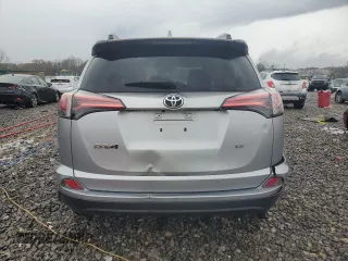 2017 Toyota RAV4 LE with VIN 2T3ZFREV4HW350558, listed as a Copart auction lot 83446744 with 87,244 mi miles and Salvage Title. Bid and sale history available at DreamBid. Image 6.
