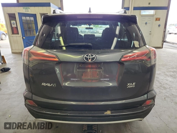 2016 Toyota RAV4 XLE with VIN 2T3RFREV6GW451194, listed as a Copart auction lot 59293325 with 168,739 mi miles and Salvage title. Bid and sale history available at DreamBid. Image 6.