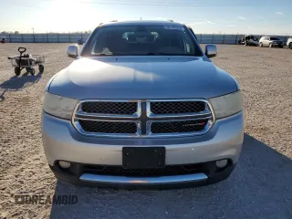 2013 Dodge Durango Crew with VIN 1C4SDHDT0DC590172, listed as a Copart auction lot 80140034 with 135,078 mi miles and Salvage title. Bid and sale history available at DreamBid. Image 5.