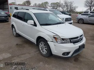 2014 Dodge Journey SXT z VIN 3C4PDCBB9ET222226, wystawiony jako IAAI lot #42056579 z przebiegiem 105 139 mil mil oraz . Historia ofert i sprzedaży dostępna na DreamBid. Obrazek 1.