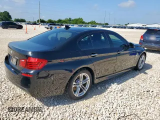 2015 BMW 5 Series 528i with VIN WBA5A5C59FD520199, listed as a Copart auction lot 59214725 with 116,914 mi miles and Salvage title. Bid and sale history available at DreamBid. Image 3.
