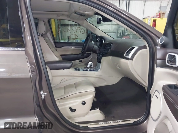 2020 Jeep Grand Cherokee Summit with VIN 1C4RJFJG1LC170714, listed as a IAAI auction lot 42247702 with 78,614 mi miles and . Bid and sale history available at DreamBid. Image 5.