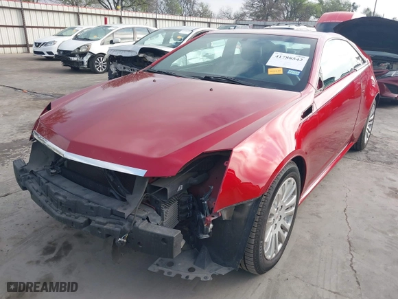2014 Cadillac CTS Coupe with VIN 1G6DA1E36E0153161, listed as a IAAI auction lot 41788542 with 100,409 mi miles. Bid and sale history available at carsss.com. Image 21.