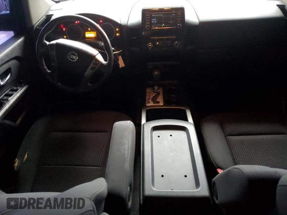 2015 Nissan Titan SL with VIN 1N6AA0ED1FN503994, listed as a Copart auction lot 39525224 with 104,353 mi miles and Salvage Title. Bid and sale history available at DreamBid. Image 8.