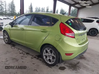 2011 Ford Fiesta SES with VIN 3FADP4FJ7BM127600, listed as a IAAI auction lot 41657170 with 135,483 mi miles. Bid and sale history available at carsss.com. Image 3.