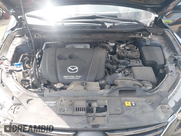 2016 Mazda CX-5 Sport z VIN JM3KE2BY0G0633611, wystawiony jako IAAI lot #42390654 z przebiegiem Nie podano mil oraz . Historia ofert i sprzedaży dostępna na DreamBid. Obrazek 10.