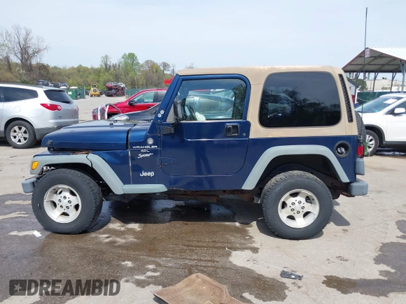 2000 Jeep Wrangler Sport with VIN 1J4FA49S5YP750123, listed as a IAAI auction lot 42060009 with Not Provided miles. Bid and sale history available at carsss.com. Image 14.