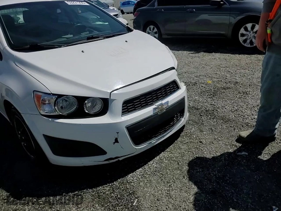 2013 Chevrolet Sonic LS with VIN 1G1JA6SH7D4120201, listed as a Copart auction lot 53231295 with 205,985 mi miles and Salvage title. Bid and sale history available at DreamBid. Image 13.