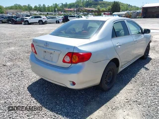 2009 Toyota Corolla with VIN 1NXBU40E39Z138651, listed as a IAAI auction lot 42142888 with 136,343 mi miles and . Bid and sale history available at DreamBid. Image 4.