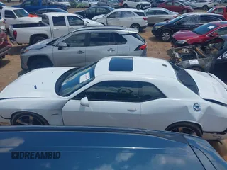 2014 Dodge Challenger R/T Plus z VIN 2C3CDYBT9EH293136, wystawiony jako IAAI lot #42264180 z przebiegiem 71 696 mil mil oraz . Historia ofert i sprzedaży dostępna na DreamBid. Obrazek 14.