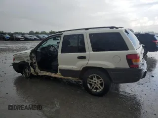 2004 Jeep Grand Cherokee Laredo z VIN 1J4GW48S74C165732, wystawiony jako Copart lot #56316885 z przebiegiem 177 139 mil mil oraz Szkoda całkowita • Salvage title. Historia ofert i sprzedaży dostępna na DreamBid. Obrazek 2.