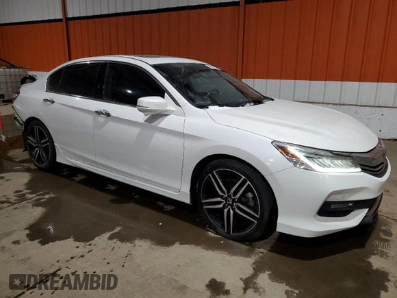 2017 Honda Accord Touring with VIN 1HGCR3F91HA802106, listed as a Copart auction lot 44224265 with 145,243 mi miles and Salvage title. Bid and sale history available at DreamBid. Image 4.