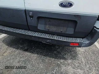 2018 Ford Transit with VIN 1FTYR1ZMXJKB47999, listed as a IAAI auction lot 42787302 with 140,957 mi miles and . Bid and sale history available at DreamBid. Image 5.