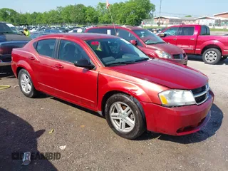 2008 Dodge Avenger SXT with VIN 1B3LC56K68N171989, listed as a IAAI auction lot 42111955 with 172,663 mi miles. Bid and sale history available at carsss.com. Image 1.