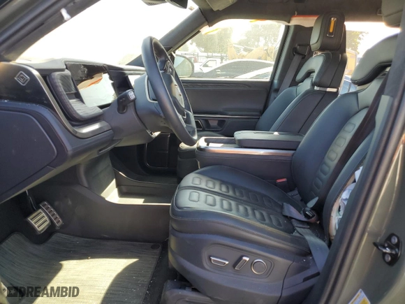 2022 Rivian R1S Launch Edition with VIN 7PDSGABL6NN000590, listed as a Copart auction lot 61510904 with 0 mi miles and Salvage Title. Bid and sale history available at carsss.com. Image 7.