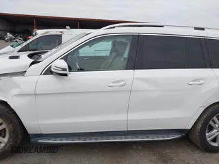 2014 Mercedes-Benz GL 450 z VIN 4JGDF7CE5EA390994, wystawiony jako IAAI lot #41618791 z przebiegiem 130 492 mil mil oraz . Historia ofert i sprzedaży dostępna na DreamBid. Obrazek 15.