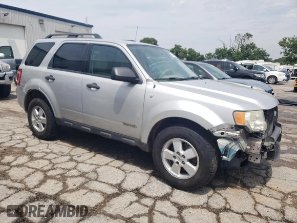 2008 Ford Escape XLT with VIN 1FMCU93128KA16982, listed as a Copart auction lot 58674645 with 214,331 mi miles and Salvage title. Bid and sale history available at DreamBid. Image 4.