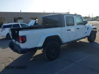 2022 Jeep Gladiator Texas Trail with VIN 1C6HJTAG4NL149537, listed as a IAAI auction lot 41947122 with 43,938 mi miles. Bid and sale history available at carsss.com. Image 4.