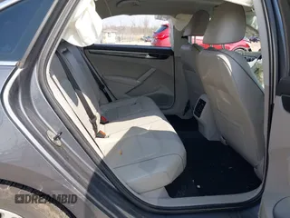 2017 Volkswagen Passat SE with VIN 1VWBT7A36HC039748, listed as a IAAI auction lot 41915674 with 57,012 mi miles and . Bid and sale history available at DreamBid. Image 8.