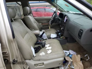 1997 Infiniti QX4 z VIN JNRAR05Y1VW016494, wystawiony jako Copart lot #73627434 z przebiegiem 270 857 mil mil oraz Szkody całkowita. Historia ofert i sprzedaży dostępna na DreamBid. Obrazek 7.