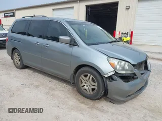 2007 Honda Odyssey EX-L z VIN 5FNRL38617B079831, wystawiony jako IAAI lot #41914159 z przebiegiem 160 143 mil mil oraz . Historia ofert i sprzedaży dostępna na DreamBid. Obrazek 1.