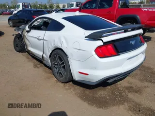 2021 Ford Mustang EcoBoost with VIN 1FA6P8TH6M5104559, listed as a IAAI auction lot 41879755 with 1 mi miles. Bid and sale history available at carsss.com. Image 3.