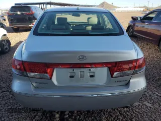 2007 Hyundai Azera SE z VIN KMHFC46F57A205043, wystawiony jako Copart lot #49531885 z przebiegiem 107 272 mil mil oraz Czysty tytuł • Clean title. Historia ofert i sprzedaży dostępna na DreamBid. Obrazek 6.