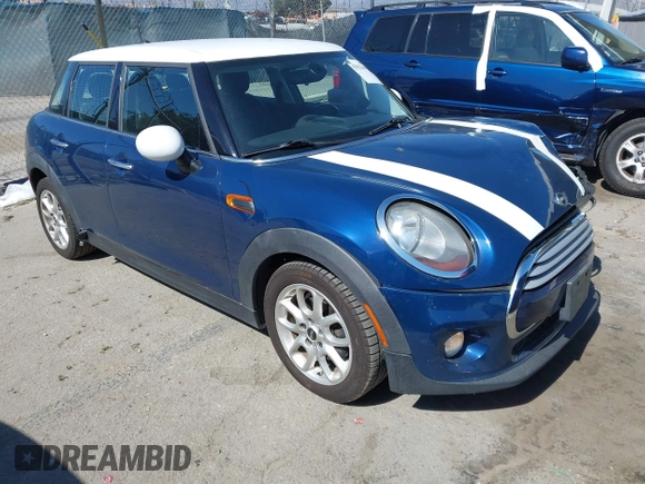 2015 MINI Hardtop 4 Door with VIN WMWXS5C50FT832438, listed as a IAAI auction lot 42632469 with 96,432 mi miles and . Bid and sale history available at DreamBid. Image 1.