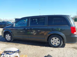 2011 Dodge Grand Caravan SXT with VIN 2D4RN4DGXBR765249, listed as a IAAI auction lot 41097760 with 95,481 mi miles and . Bid and sale history available at DreamBid. Image 14.