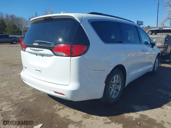 2020 Chrysler Voyager LXI with VIN 2C4RC1DGXLR256863, listed as a IAAI auction lot 41744700 with 86,470 mi miles. Bid and sale history available at carsss.com. Image 4.