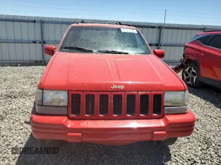 1997 Jeep Grand Cherokee Limited with VIN 1J4GZ78Y7VC573971, listed as a Copart auction lot 61358024 with 171,055 mi miles and Salvage Title. Bid and sale history available at carsss.com. Image 5.