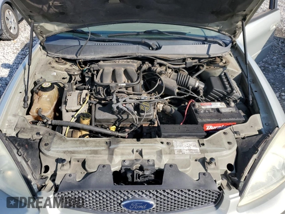 2005 Ford Taurus SE with VIN 1FAFP53U95A101336, listed as a Copart auction lot 56457095 with 127,656 mi miles and Salvage title. Bid and sale history available at DreamBid. Image 11.