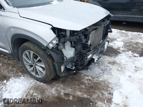 2019 Hyundai Santa Fe Ultimate with VIN 5NMS5CAD1KH000394, listed as a IAAI auction lot 41455421 with 42,886 mi miles and . Bid and sale history available at DreamBid. Image 17.