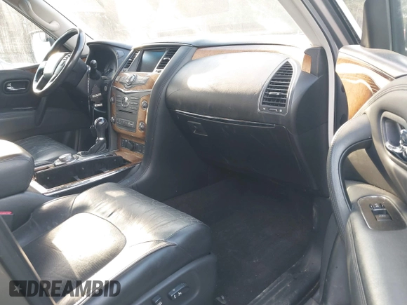 2011 Infiniti QX56 8-passenger with VIN JN8AZ2NC1B9301274, listed as a IAAI auction lot 41865441 with 221,759 mi miles. Bid and sale history available at carsss.com. Image 5.