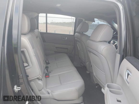 2012 Honda Pilot EX-L with VIN 5FNYF4H70CB071764, listed as a IAAI auction lot 41940032 with 111,963 mi miles and . Bid and sale history available at DreamBid. Image 8.