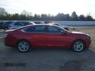 2014 Chevrolet Impala LT with VIN 2G1125S38E9314424, listed as a IAAI auction lot 41973052 with 186,209 mi miles and . Bid and sale history available at DreamBid. Image 13.