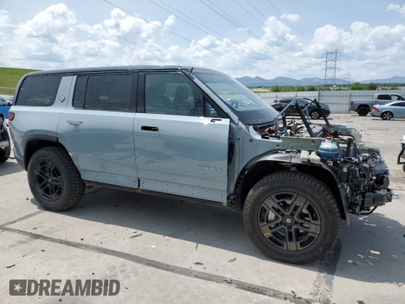 2025 Rivian R1S Adventure z VIN 7PDSGBBA2SN051004, wystawiony jako Copart lot #58999005 z przebiegiem 786 mil mil oraz Szkoda całkowita • Salvage title. Historia ofert i sprzedaży dostępna na DreamBid. Obrazek 4.