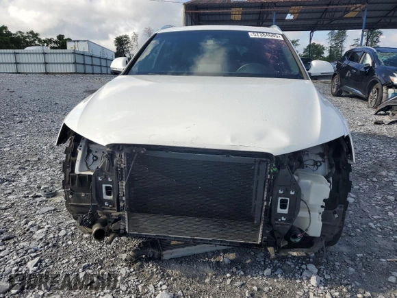 2016 Audi Q3 Prestige with VIN WA1FFCFS0GR007940, listed as a Copart auction lot 57384685 with 61,336 mi miles and Salvage title. Bid and sale history available at DreamBid. Image 5.