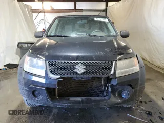 2011 Suzuki Grand Vitara Premium z VIN JS3TD0D24B4103142, wystawiony jako Copart lot #43715135 z przebiegiem 170 422 mil mil oraz Szkoda całkowita • Salvage title. Historia ofert i sprzedaży dostępna na DreamBid. Obrazek 5.