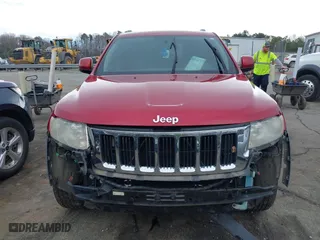 2011 Jeep Grand Cherokee Laredo with VIN 1J4RR4GT8BC636651, listed as a IAAI auction lot 41768944 with 200,160 mi miles. Bid and sale history available at carsss.com. Image 12.
