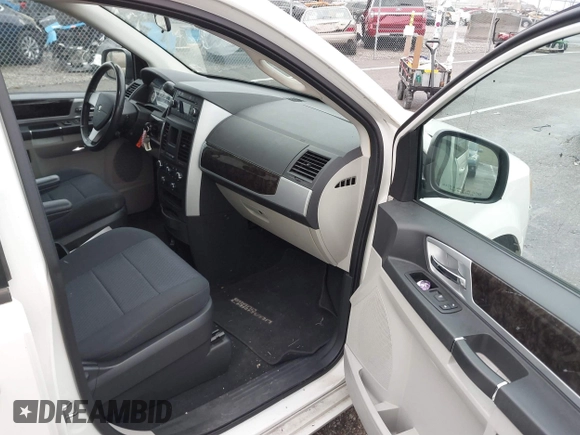 2010 Dodge Grand Caravan SXT with VIN 2D4RN5D1XAR191011, listed as a IAAI auction lot 41162015 with 83,251 mi miles and . Bid and sale history available at DreamBid. Image 5.