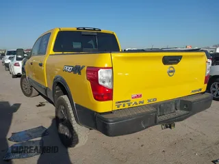 2016 Nissan Titan SL z VIN 1N6BA1F48GN500066, wystawiony jako IAAI lot #41857911 z przebiegiem 133 303 mil mil oraz . Historia ofert i sprzedaży dostępna na DreamBid. Obrazek 3.