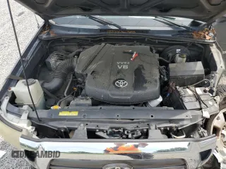 2010 Toyota Tacoma PreRunner with VIN 5TEJU4GN7AZ711911, listed as a Copart auction lot 60200385 with 209,579 mi miles and Salvage title. Bid and sale history available at DreamBid. Image 11.